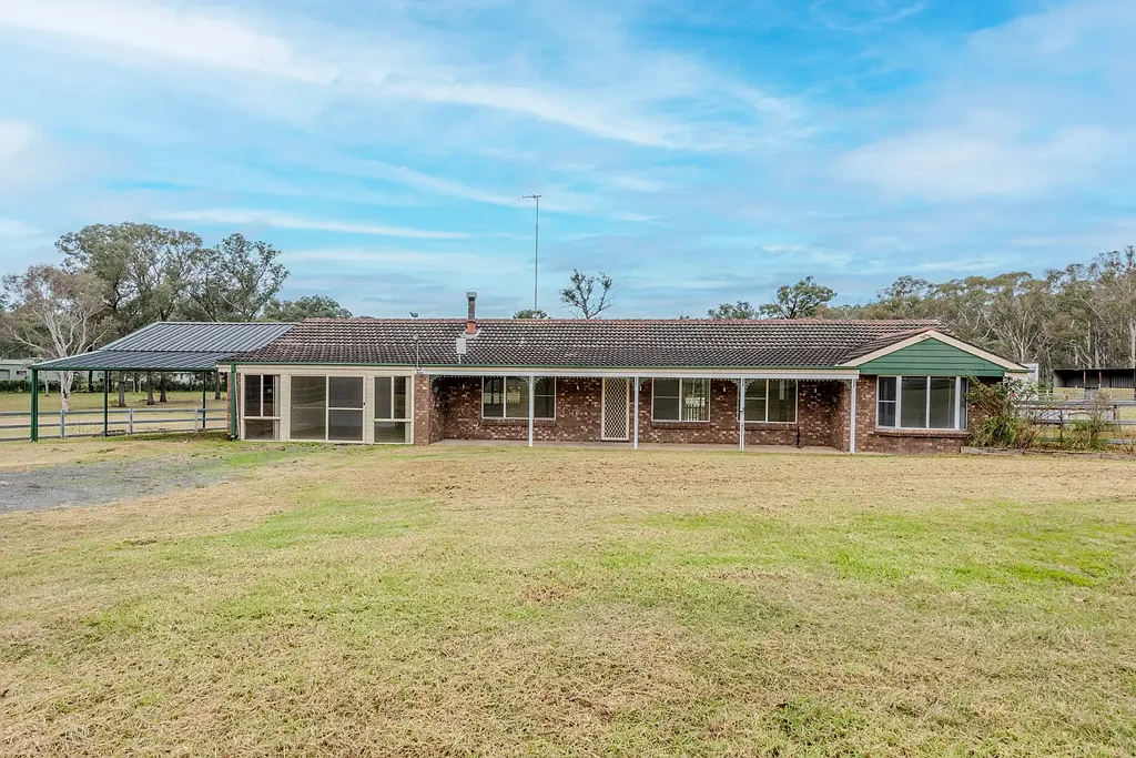 Large family home on 5-acre with inground swimming pool.