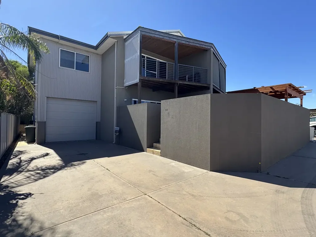 Tucked Away at the Rear - Two-Storey Living with Room to Relax!