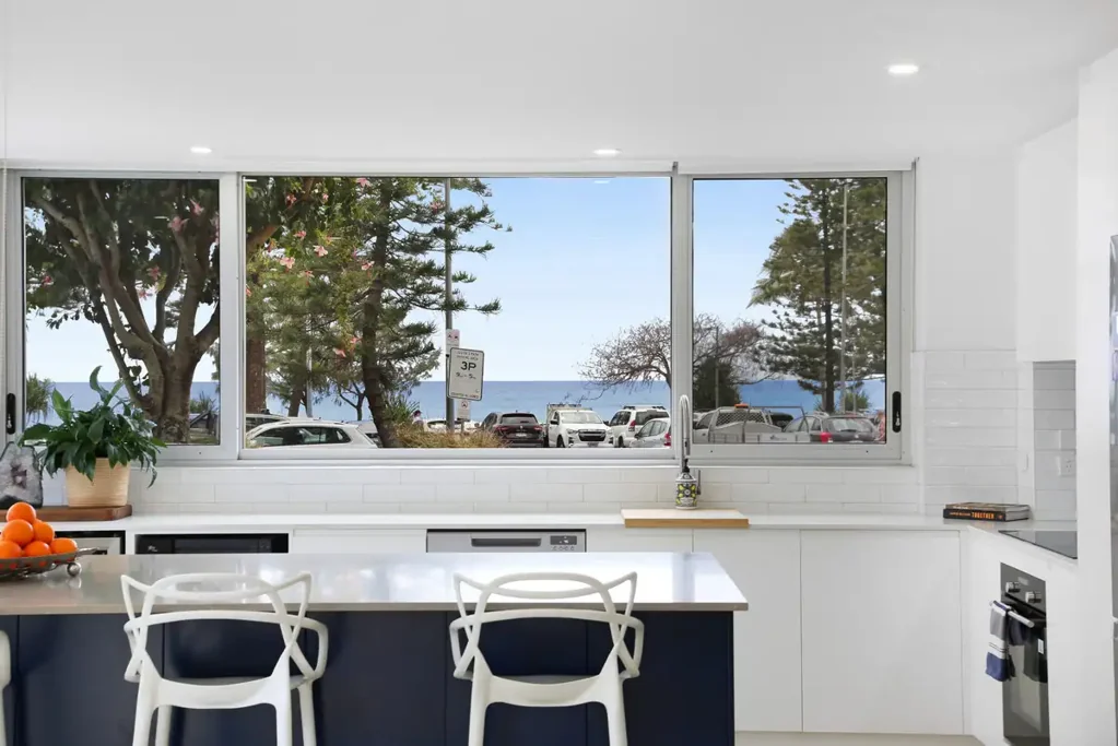 Renovated Ground-Floor Retreat Just Steps from the Sand!