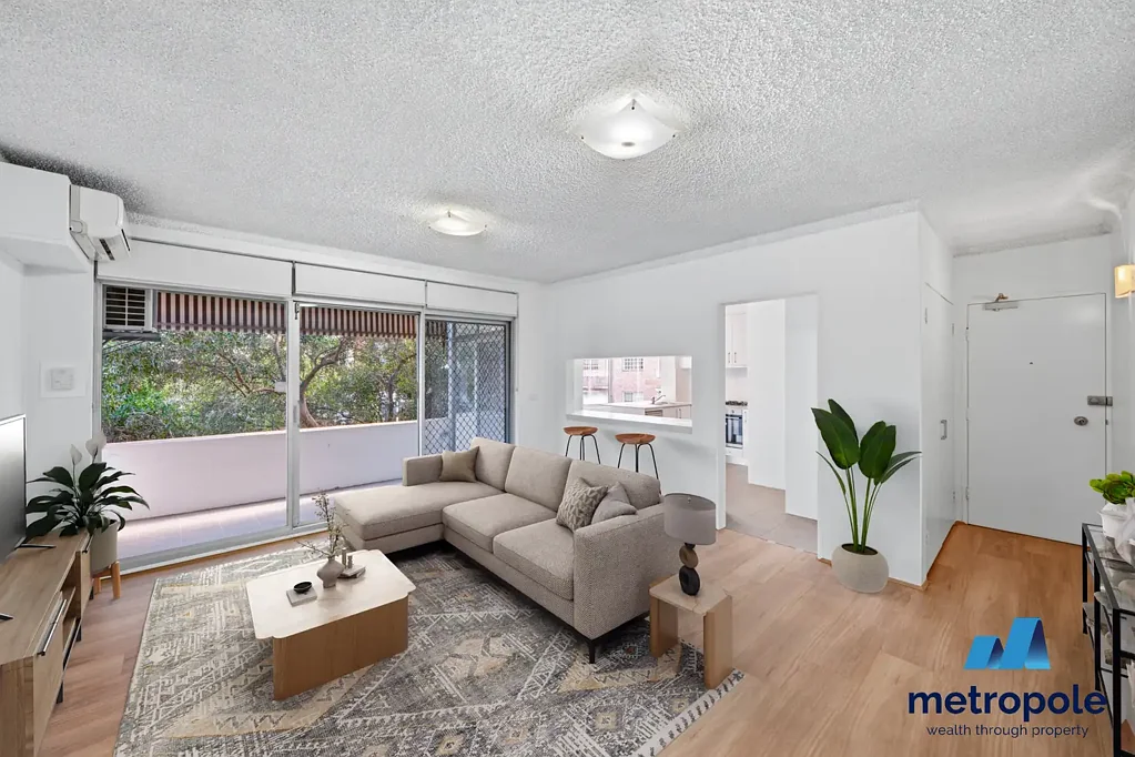 NEWLY INSTALLED FLOORBOARDS THROUGHOUT – TWO BEDROOM LIVING WITH SUNROOMS, LOCK UP GARAGE AND  SUNNY BALCONY