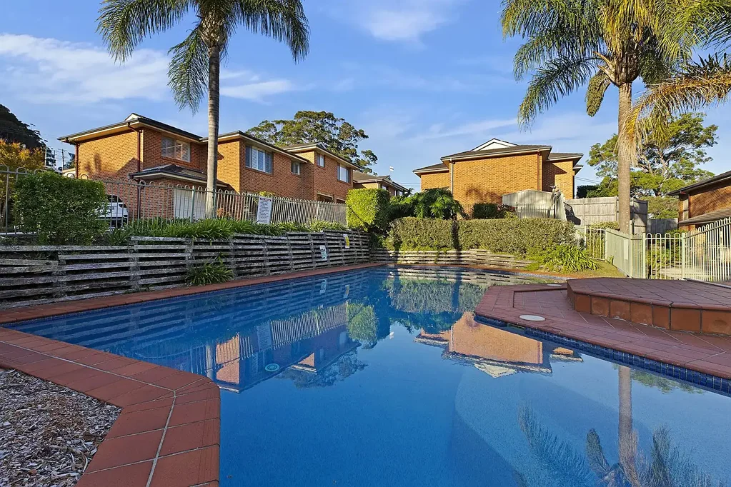 Spacious Four-Bedroom Townhouse with Pool Access