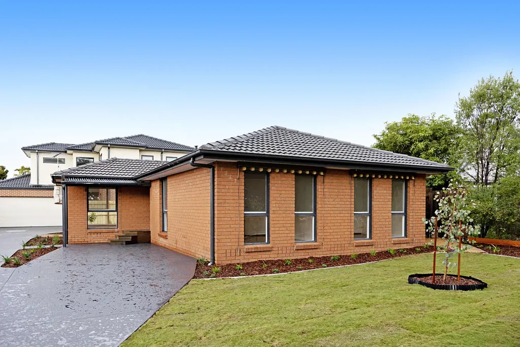 Light-Filled Single-Level Brick Home with Spacious Backyard