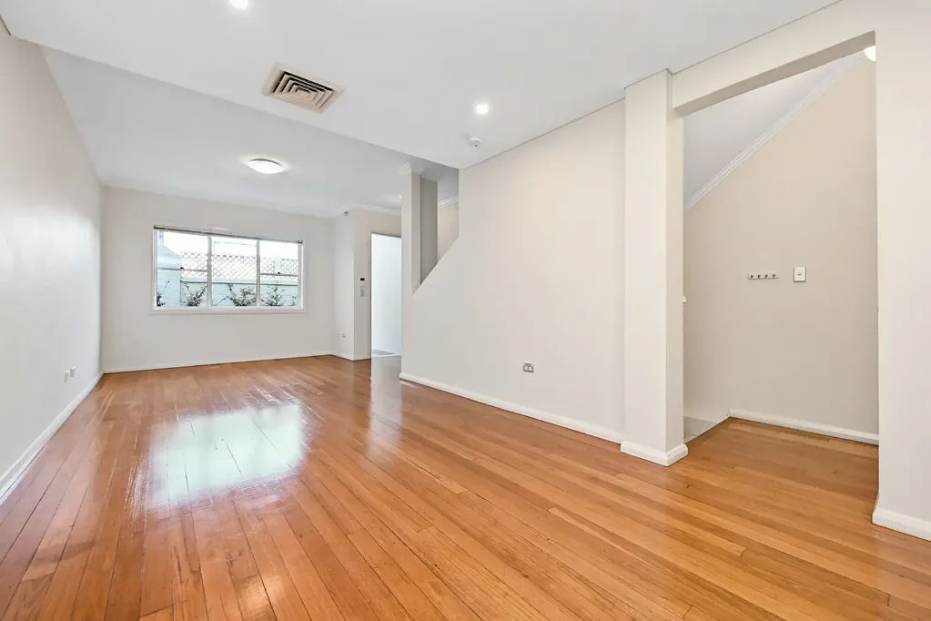 Stylish Tri-Level Townhouse with Courtyard & Oversized Garage