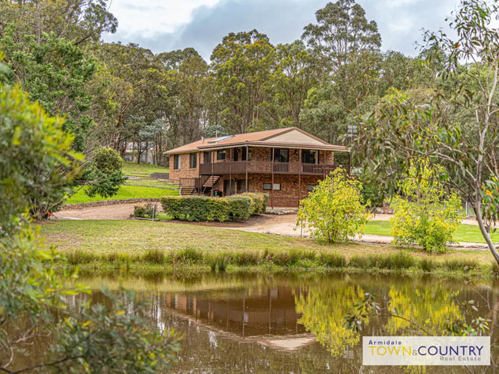 Armidale Nestled on nine stunning acres, this beautifully presented brick home offers the perfect blend of country charm and modern convenience.