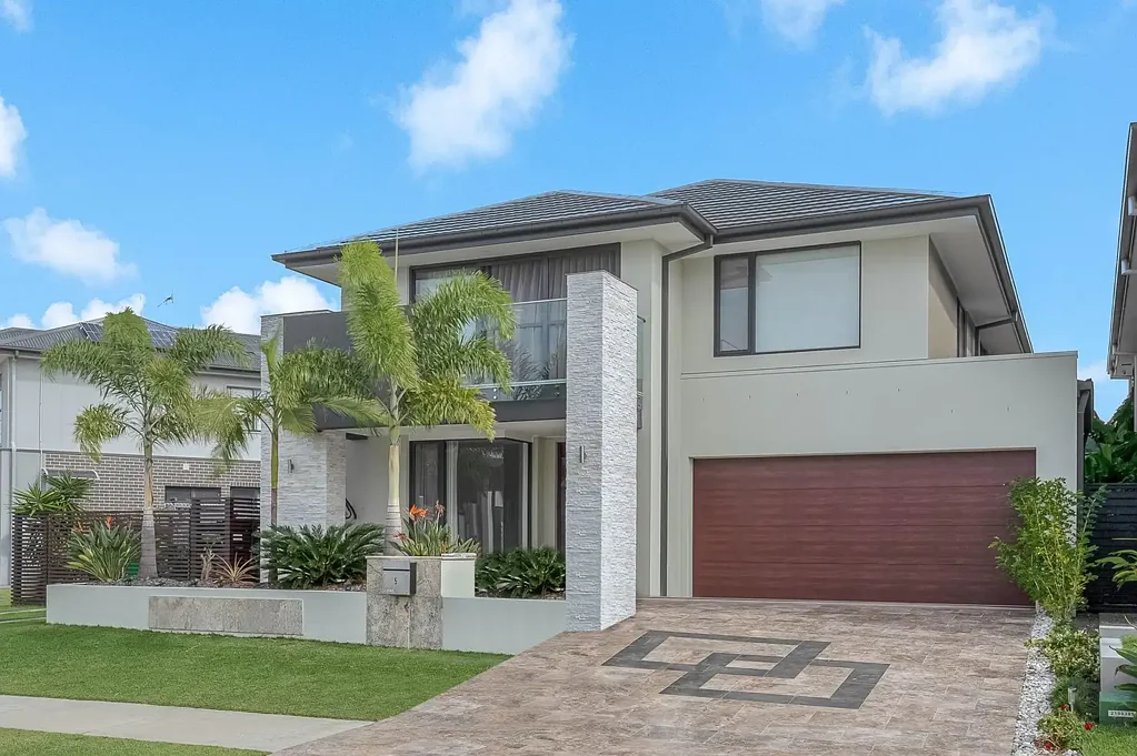 Modern and Spacious Executive Residence with views of the Lake plus Heated Pool & Solar!