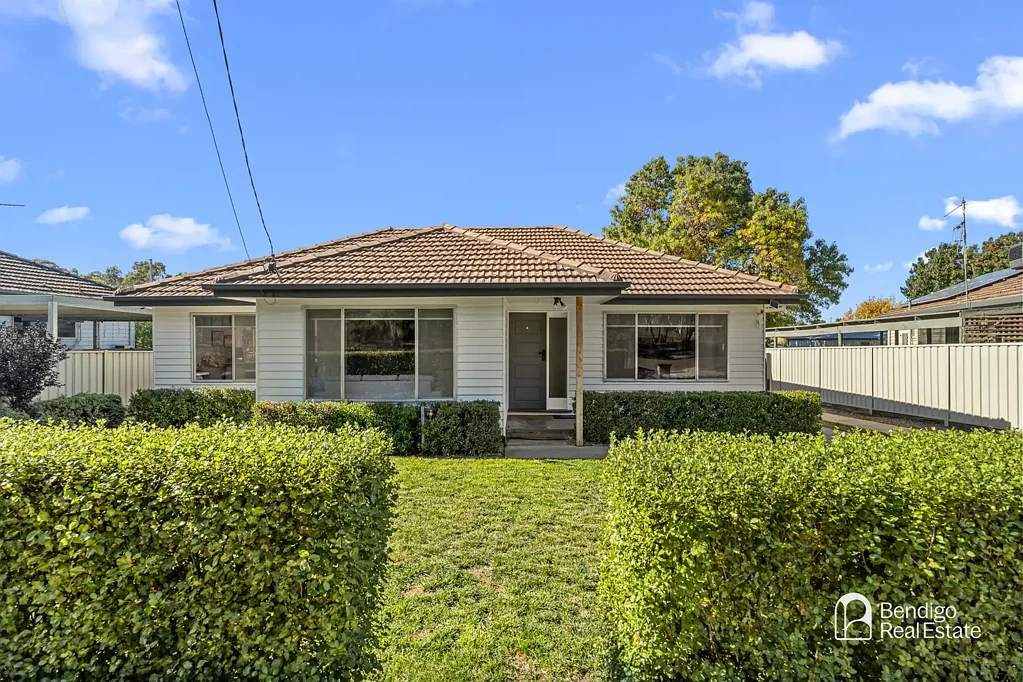 LOW-MAINTENANCE HOME WITH LARGE SHED AND OUTDOOR ENTERTAINING