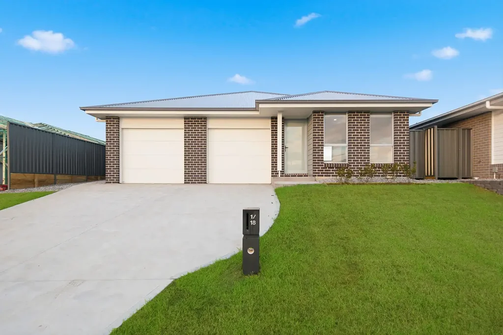 Modern 4-Bedroom Home in Sought-After Lochinvar
