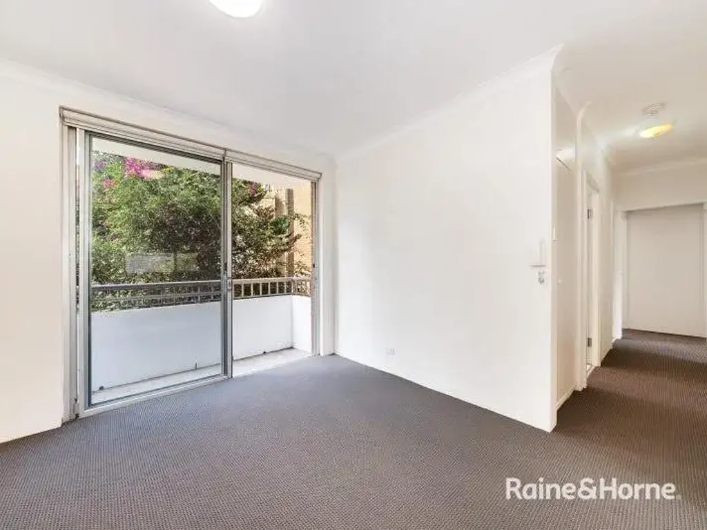 BRIGHT TWO-BEDROOM PLUS STUDY WITH PARKING!