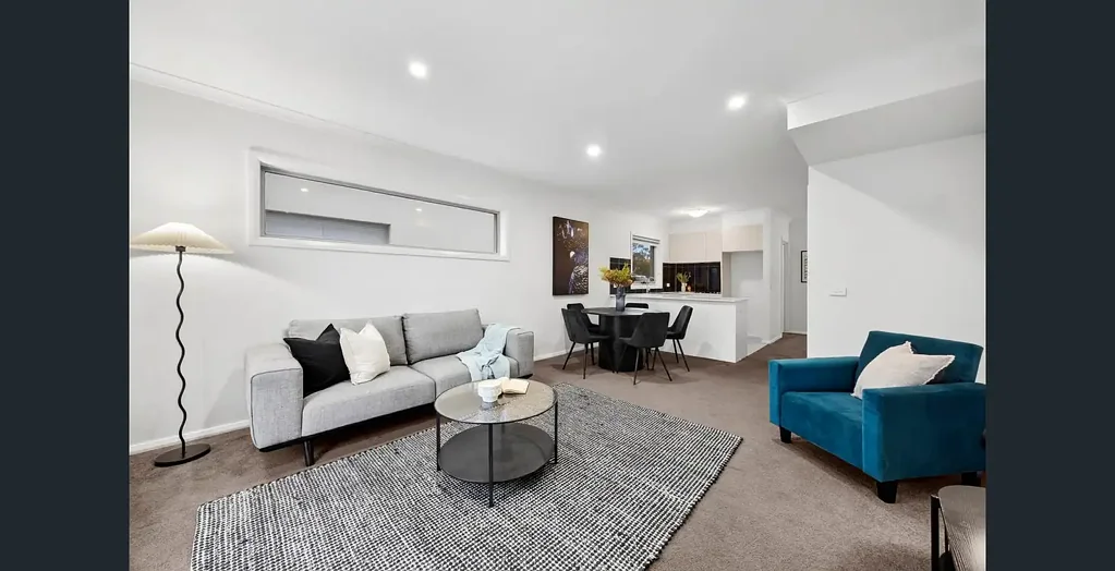 Modern Three-Bedroom Townhouse in a Quiet Community Setting