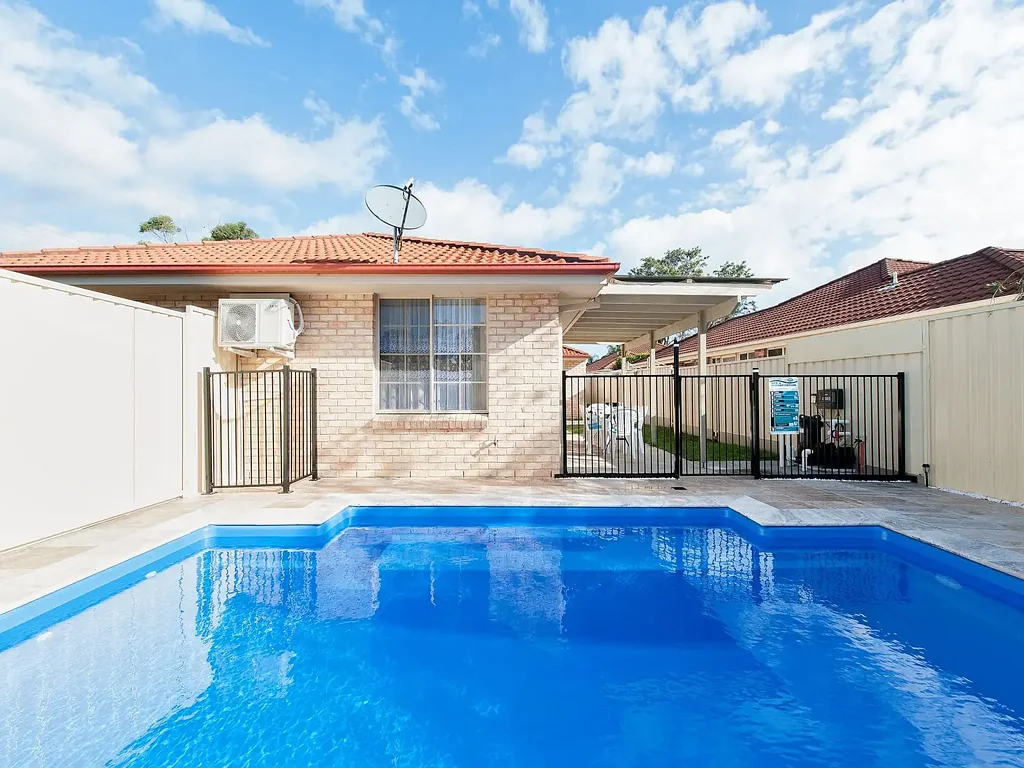 Family sized 3-bedroom 2-bathroom duplex with inground pool