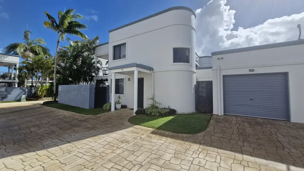 Fully self contained, furnished corner unit near beach