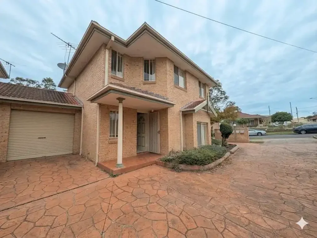 Spacious 3-Bedroom Townhouse with Lock-Up Garage in Prime Location