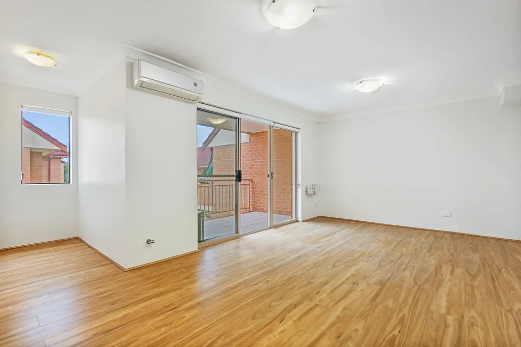 Parkside Dual-Level Apartment - Steps from Shops & Station!