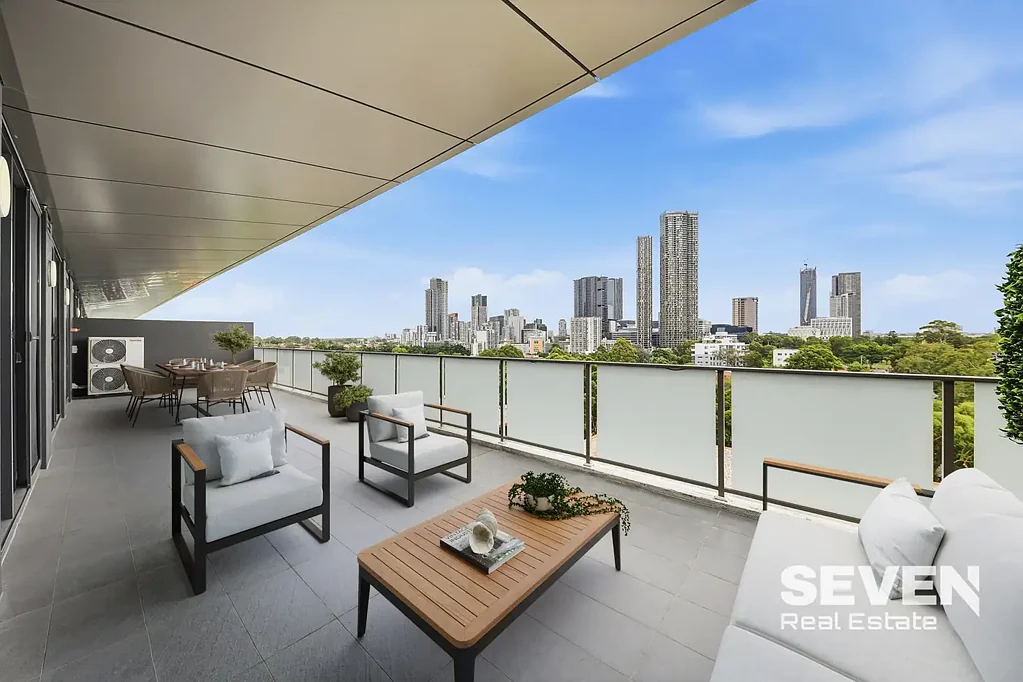 Parramatta 3房 顶层公寓位置 宽敞开敞布局 超大娱乐阳台 CBD全景视野 现代厨房设计 三个比例卧室 主卧带套间 超大书房空间 全屋木地板 两个安全车位 Penthouse Living in the River Precinct with Expansive Balcony & CBD Views