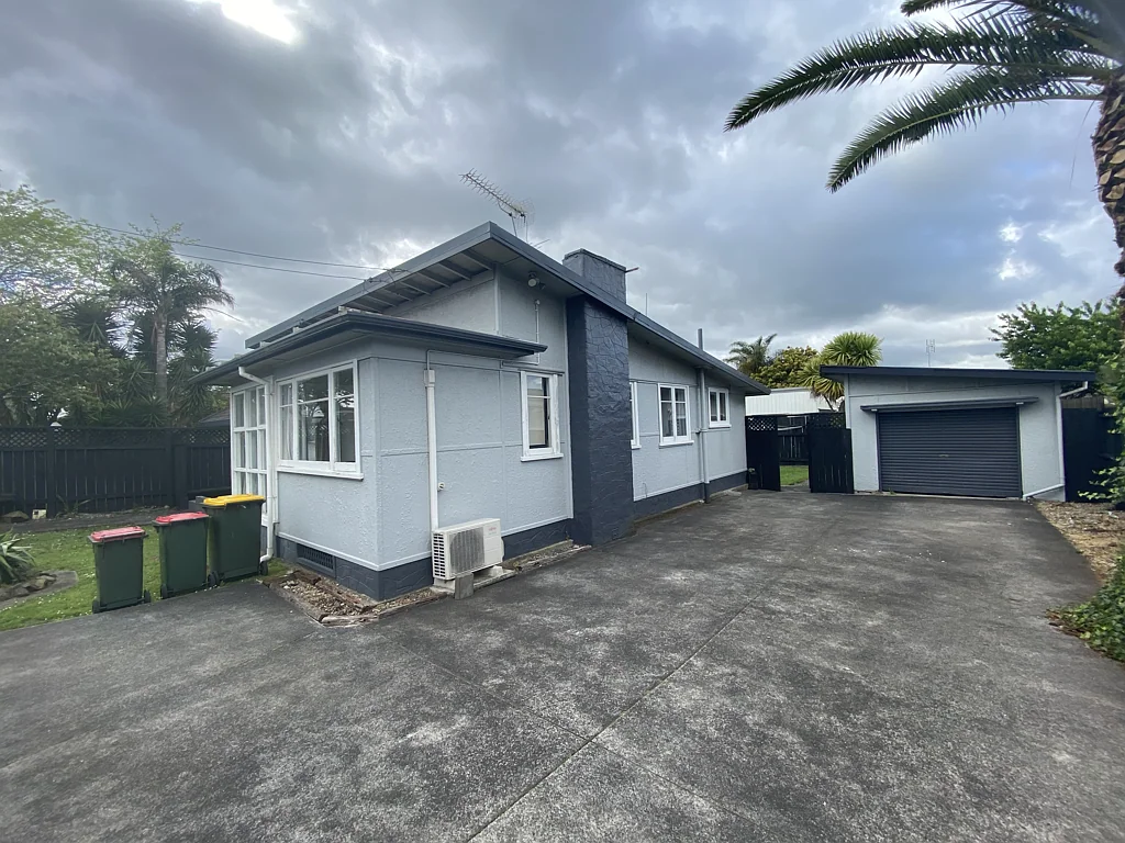 Charming 3-Bedroom Home with Garage & Extra Storage
