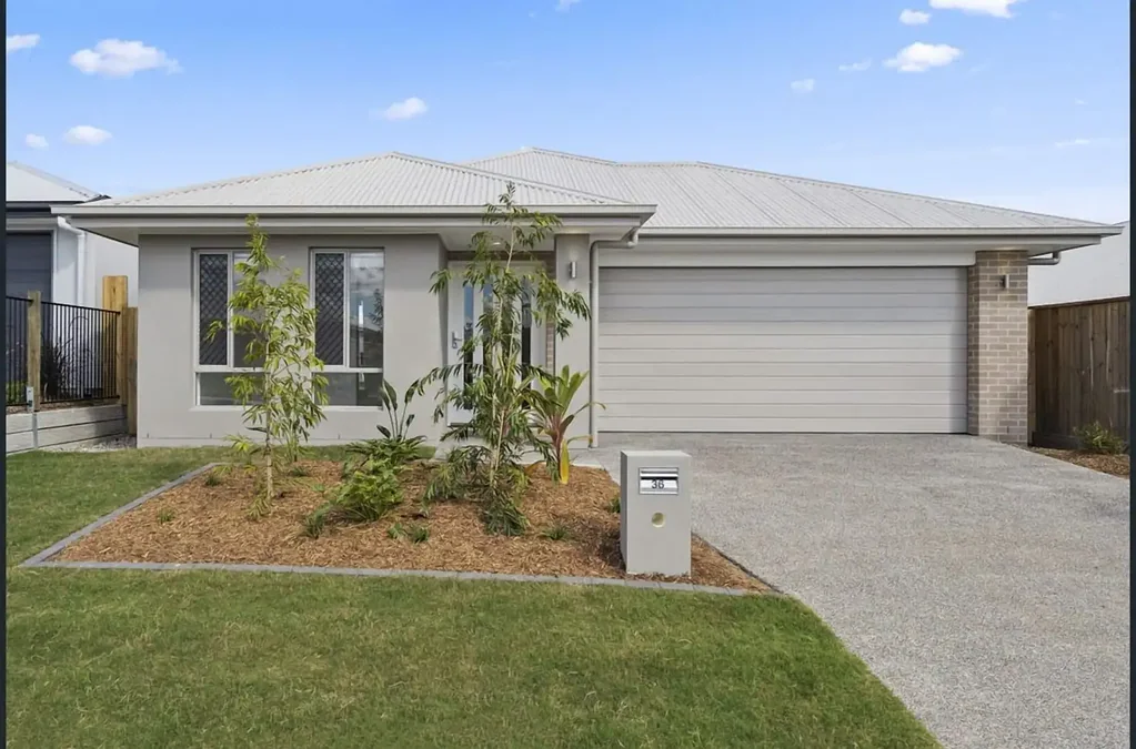 Two Living Zones. A Butler's-Style Kitchen. A Backyard the Kids Can Actually Run In.