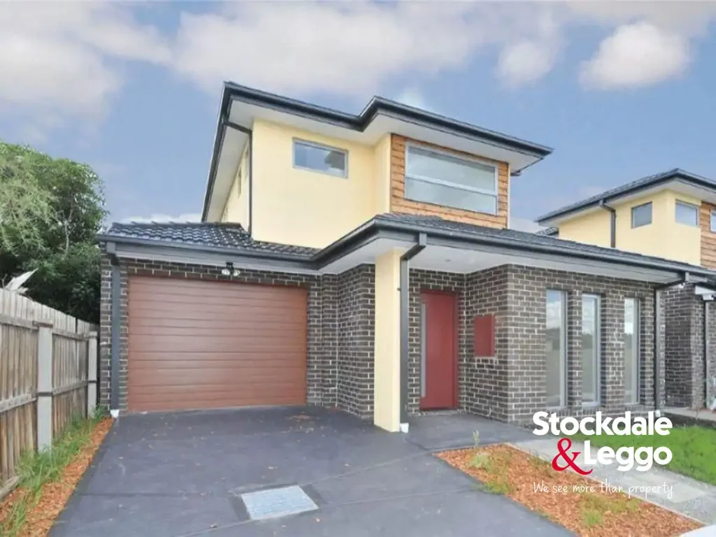 This Townhouse Is Sure To Impress!