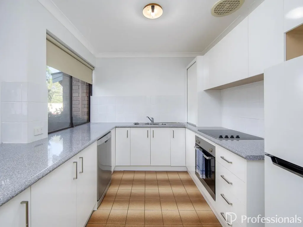 SECURE UNIT AND IDEALLY LOCATED!