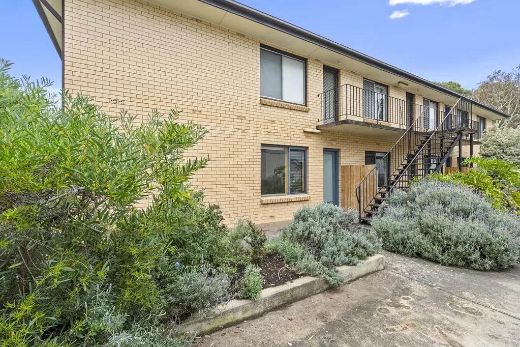 Well located unit featuring private courtyard