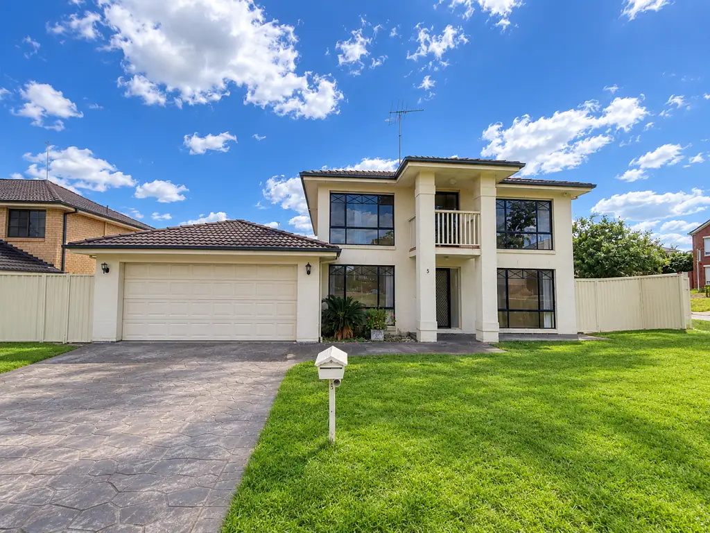 Spacious Family Living in a Large Home with Multiple Living Areas!