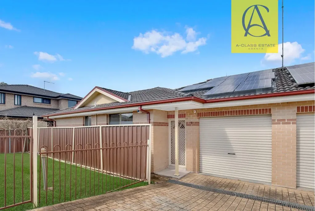 Charming 3-Bedroom Home with Double Tandem Garage and Year-Round Usable Yard