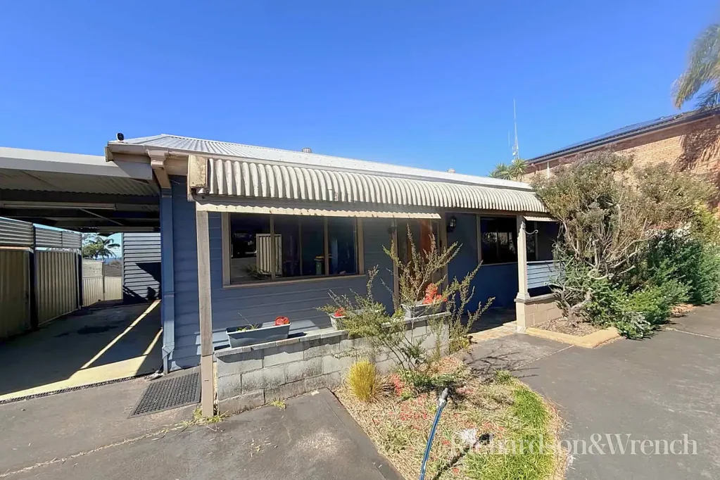 Spacious Family Home with Huge Garage, Studio & Multiple Car Spaces