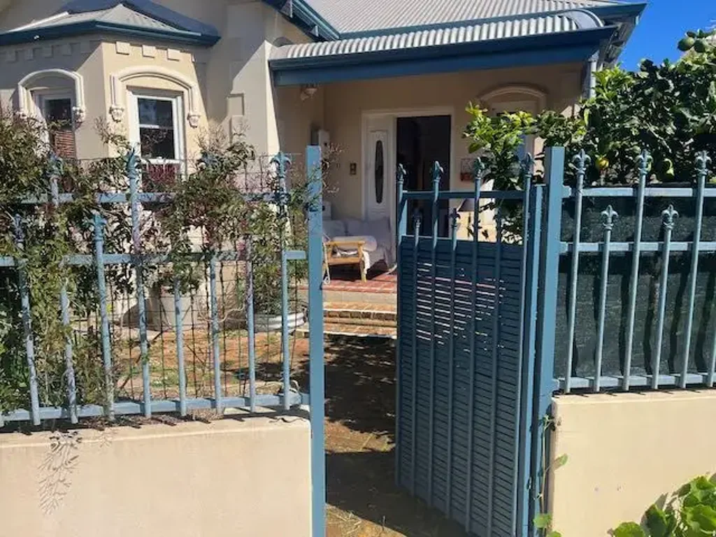 Comfortable, light filled front of house. Rental includes utilities.