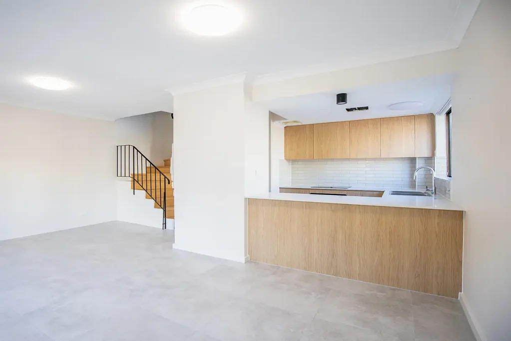 Two-Bedroom Townhouse in Prime Newtown Location with Parking - Access via Rear Lane