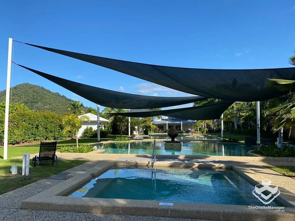 Partly furnished 2 BEDROOM UNIT IN TROPICAL RESORT STYLE  APARTMENTS