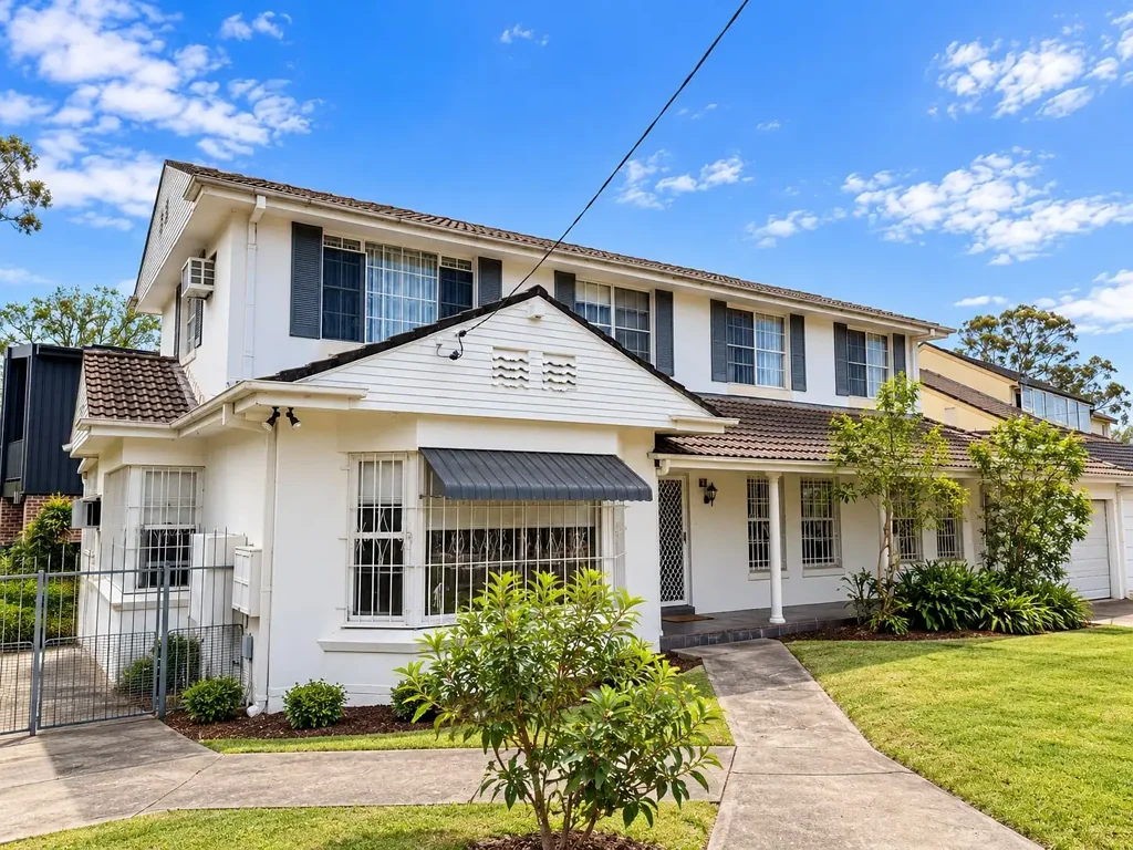 Spacious Six-Bedroom Family Home with Multiple Living Areas and Five Car Spaces in Strathfield
