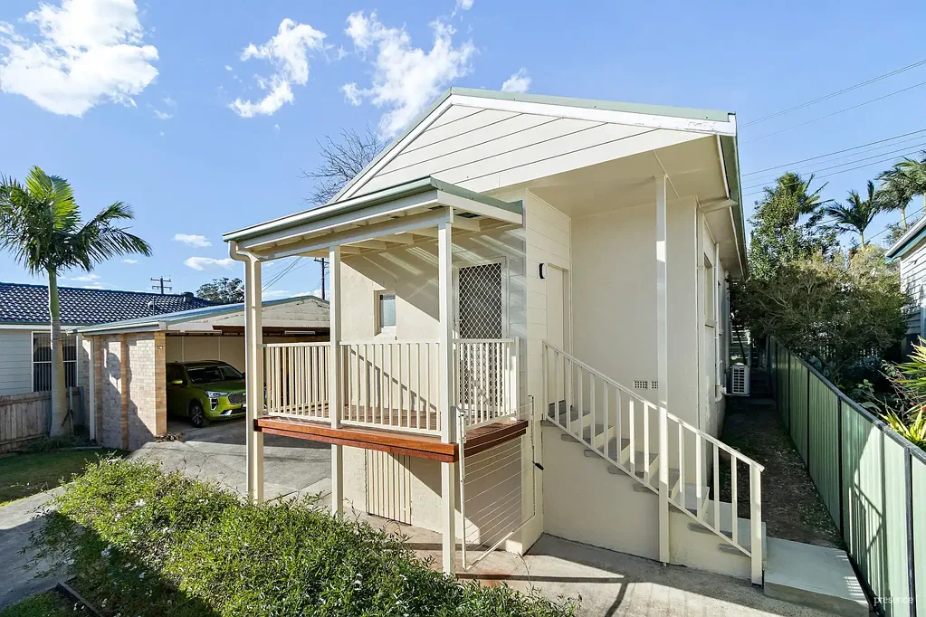 FRESH, LOW-MAINTENANCE LIVING WITH OFF-STREET PARKING