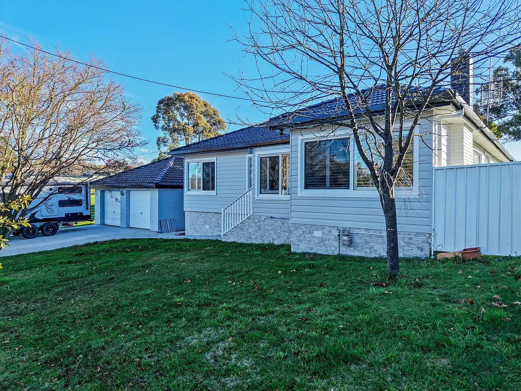 Fully Renovated Home with Side Access & Workshop