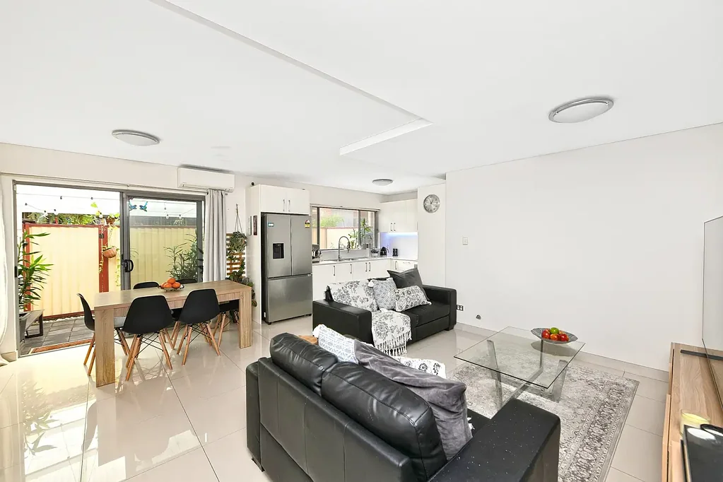 Perfectly positioned dual-level townhouse with private courtyard