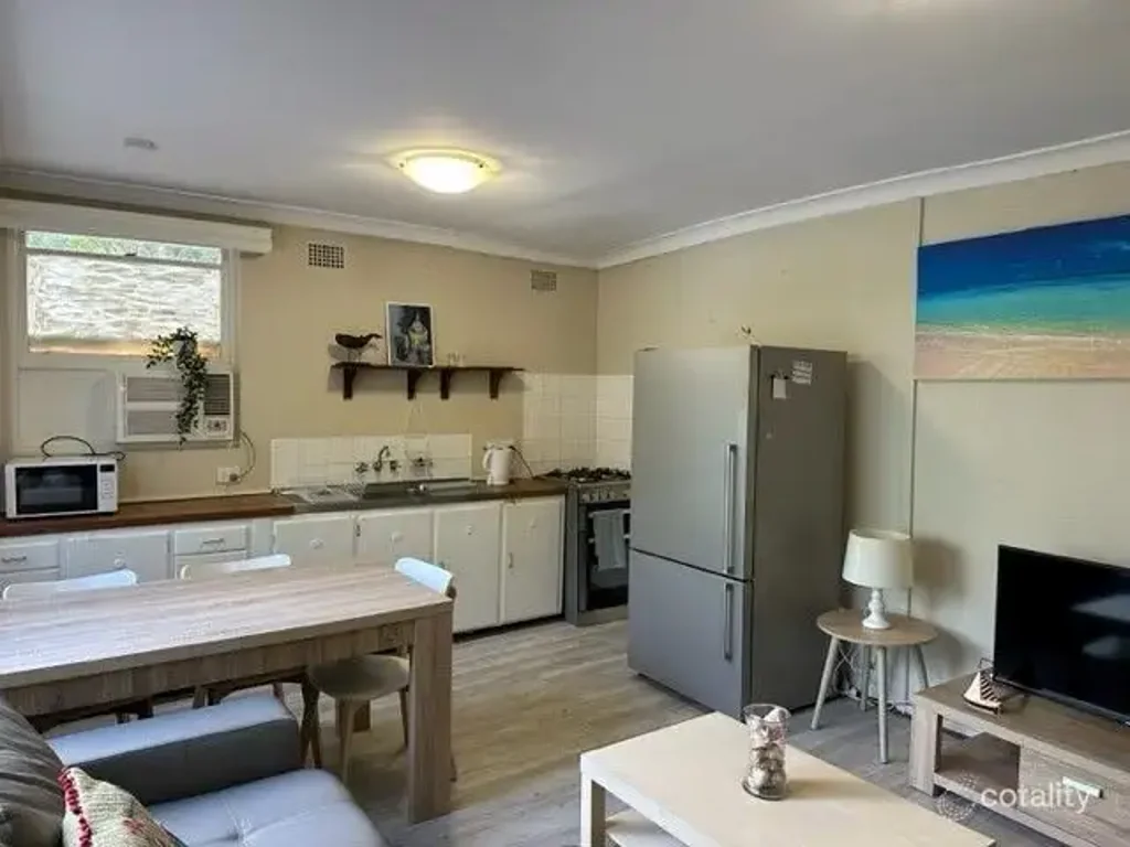 PARTLY FURNISHED UNIT IN GREAT LOCATION