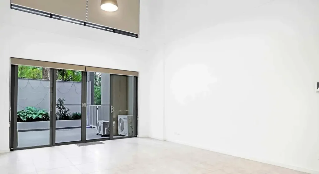 Stylish Two-Level Apartment with Courtyard in a Prime Location