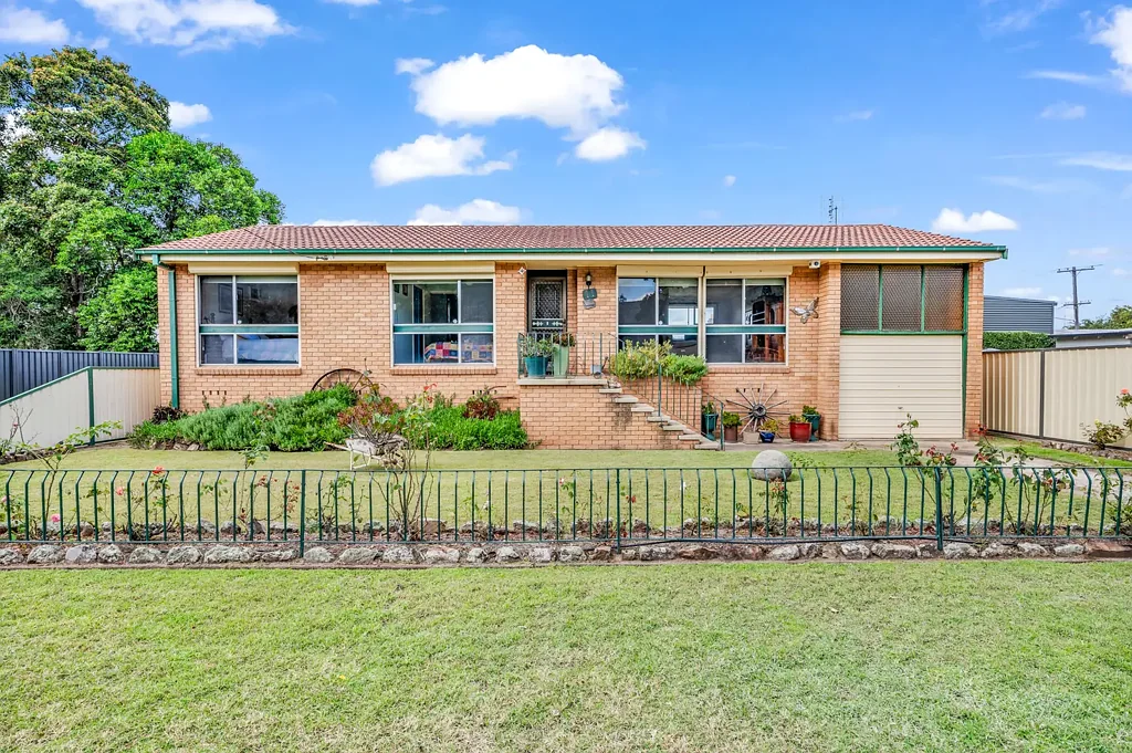 Singleton 3 Bedroom Charming Downtown Brick Home with Excellent Investment Potential!
