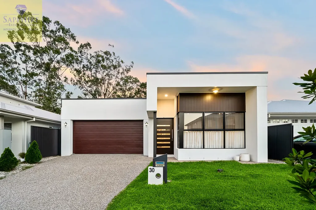 Spacious 4-Bedroom Family Home with Double Garage in Prime Pallara Location
